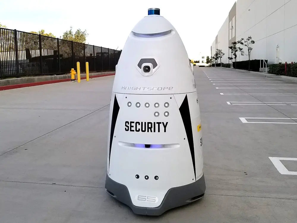 Lowes security robot patrolling parking lot